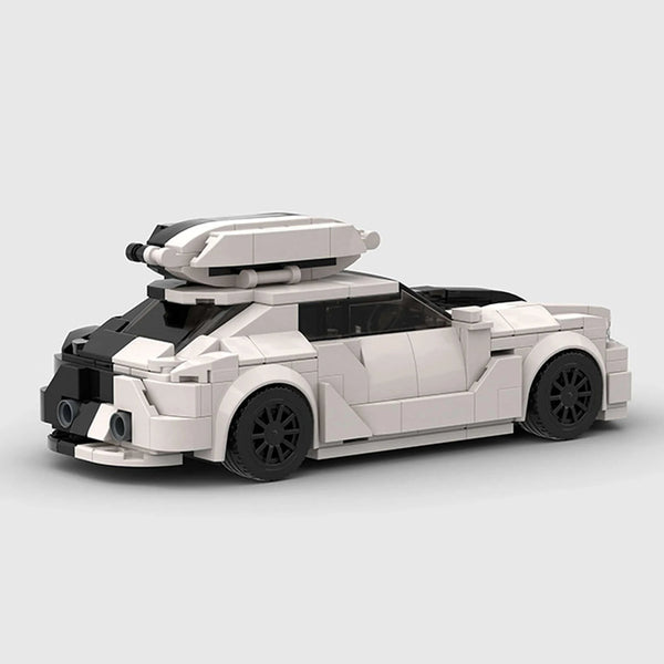 Black and white split livery Audi RS6 Avant brick model rear three quarter view