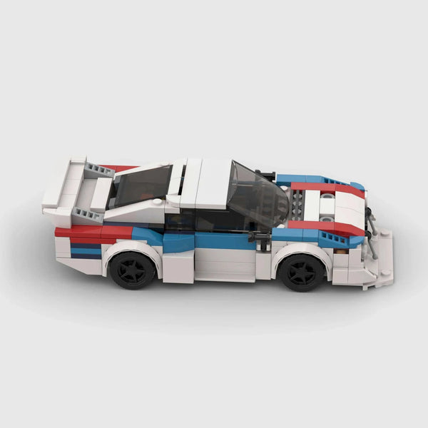 White with blue and red accents BMW M1 brick model side profile view