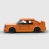 Orange BMW M3 E30 brick model side profile view