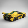 Yellow and green McLaren P1 GTR Yellow Edition brick model rear three quarter view