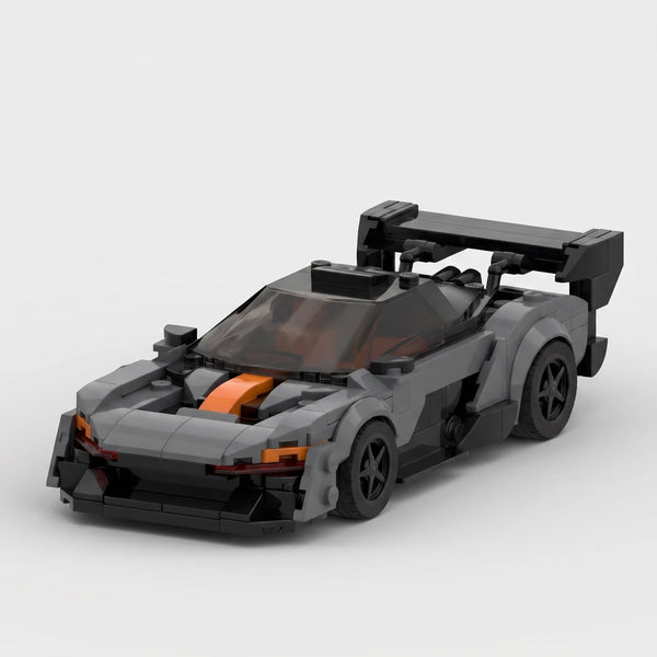 Dark grey and orange McLaren Senna GTR Grey Edition brick model front three quarter view