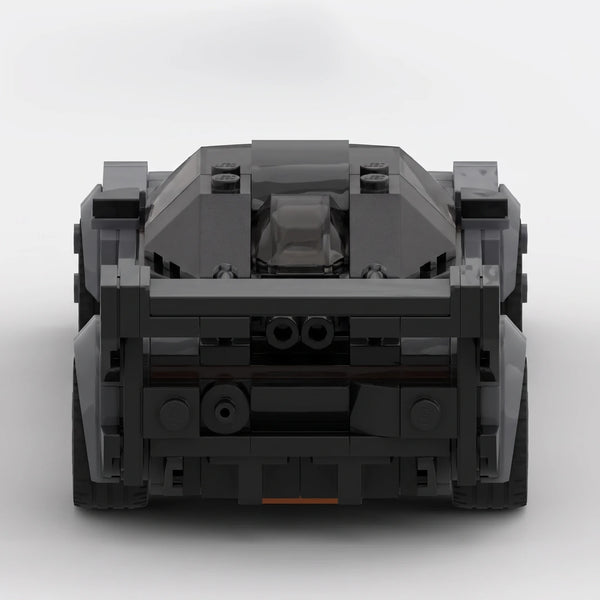 Dark grey and orange McLaren Senna GTR Grey Edition brick model straight rear view