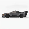 Dark grey and orange McLaren Senna GTR Grey Edition brick model side profile view