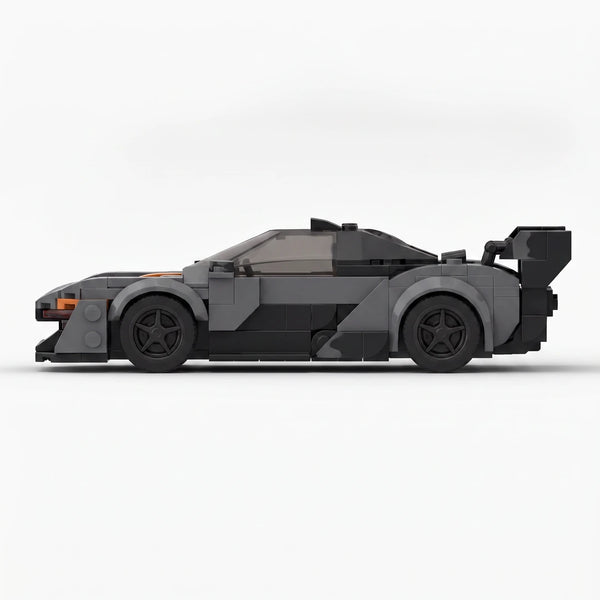 Dark grey and orange McLaren Senna GTR Grey Edition brick model side profile view