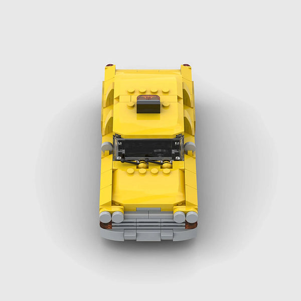 Yellow with black and white checkerboard stripe Checker Marathon brick model front view
