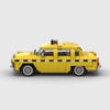 Yellow with black and white checkerboard stripe Checker Marathon brick model side profile view