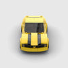 Yellow with black racing stripes Chevrolet Camaro brick model front view