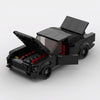 Black Ford Mustang Fastback brick model with opening features