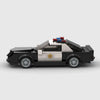 Black and white police livery Ford Mustang brick model side profile view