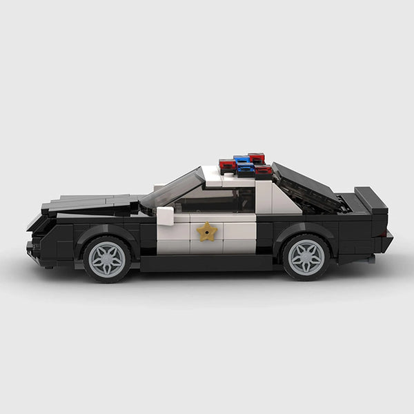 Black and white police livery Ford Mustang brick model side profile view