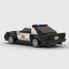 Black and white police livery Ford Mustang brick model rear three quarter view