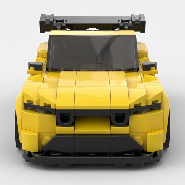 Yellow Ford Mustang GT3 Le Mans Edition brick model straight front view