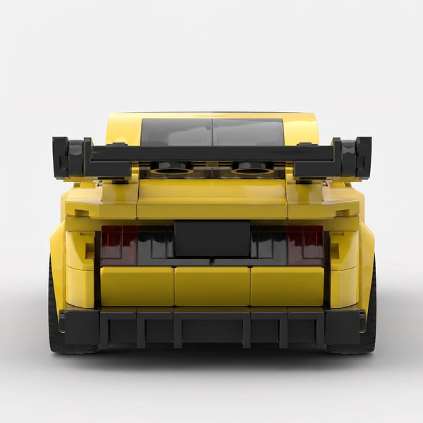 Yellow Ford Mustang GT3 Le Mans Edition brick model straight rear view