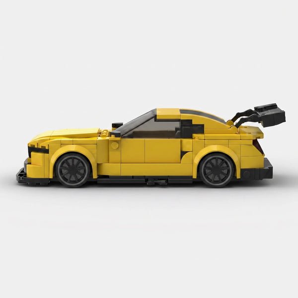 Yellow Ford Mustang GT3 Le Mans Edition brick model alternate side profile view