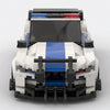 White and blue Ford Mustang Police Edition brick model straight front view