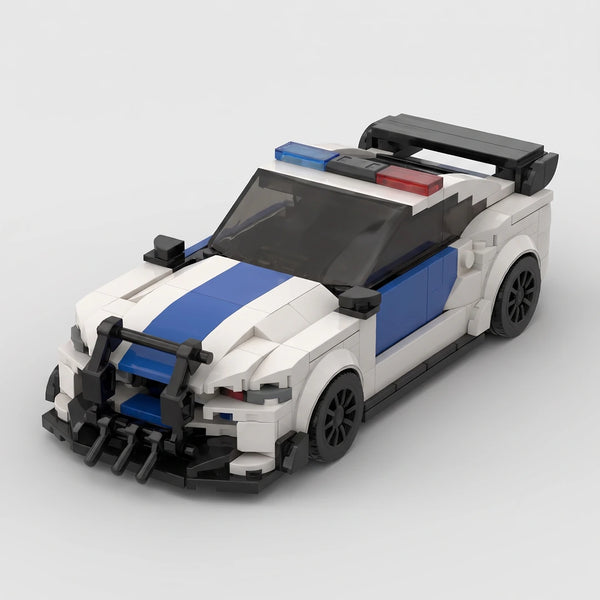 White and blue Ford Mustang Police Edition brick model high front three quarter view