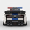 White and blue Ford Mustang Police Edition brick model straight rear view