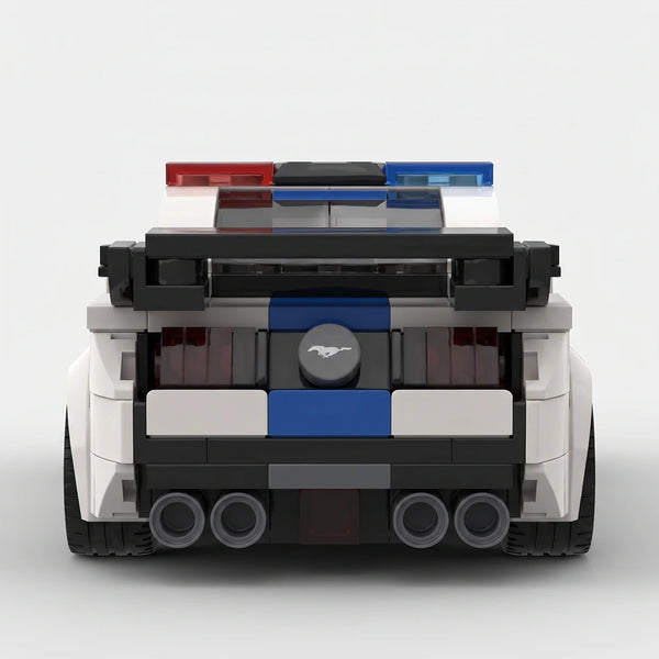 White and blue Ford Mustang Police Edition brick model straight rear view