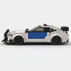 White and blue Ford Mustang Police Edition brick model side profile view