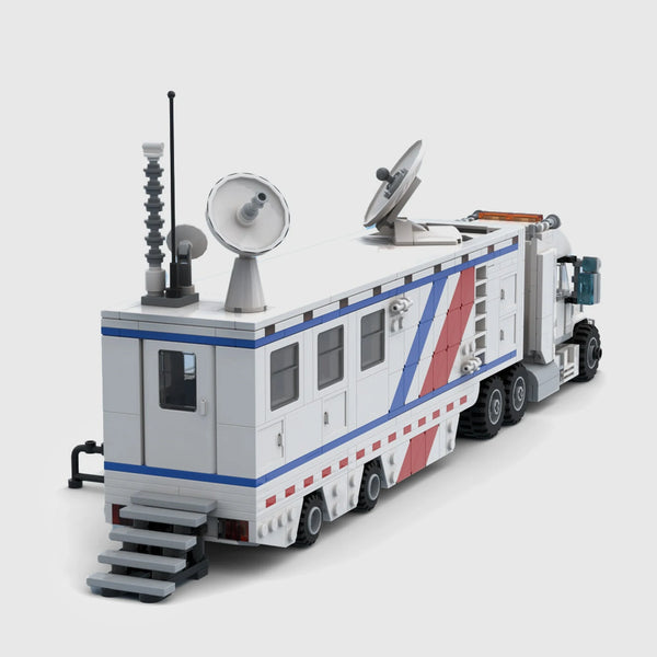 White with red and blue stripes Kenworth brick model rear three quarter view