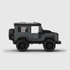 Grey with black roof and accents Land Rover Defender 90 brick model side profile view