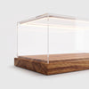 Close up of the acacia wood base and the LED strip of the display case