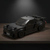 Mazda RX7 Black Edition Brick Model displayed in a premium collector setup
