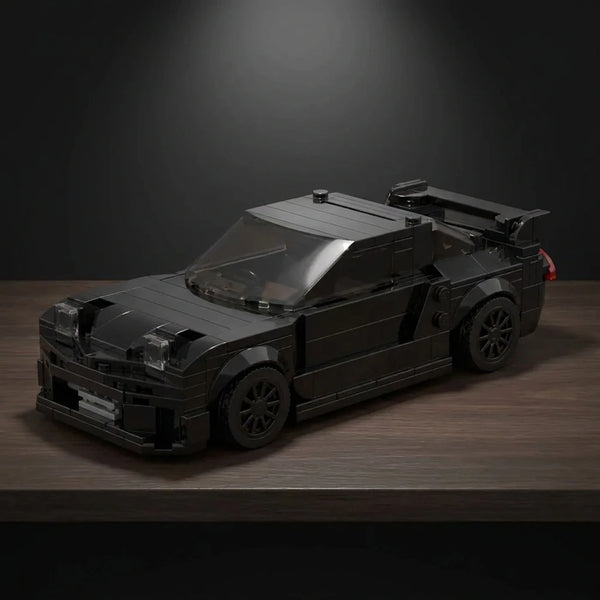 Mazda RX7 Black Edition Brick Model displayed in a premium collector setup