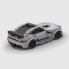Grey Mercedes-Benz AMG GT brick model rear three quarter view