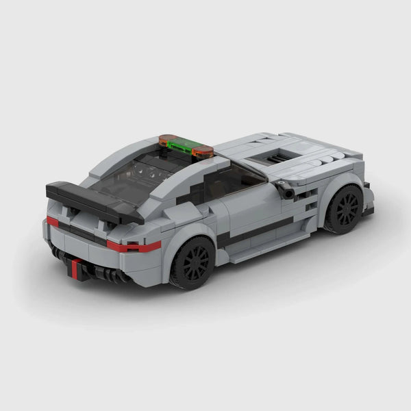 Grey Mercedes-Benz AMG GT brick model rear three quarter view