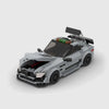 Grey Mercedes-Benz AMG GT brick model close up detail view
