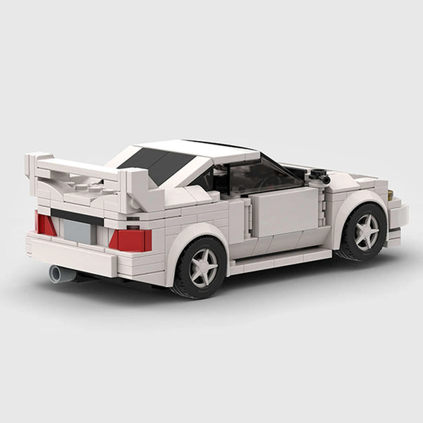 White Mitsubishi Lancer Evolution brick model rear three quarter view