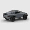 Grey Tesla Cybertruck brick model rear three quarter view