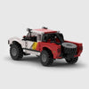 White and red with yellow and orange accents brick model rear three quarter view