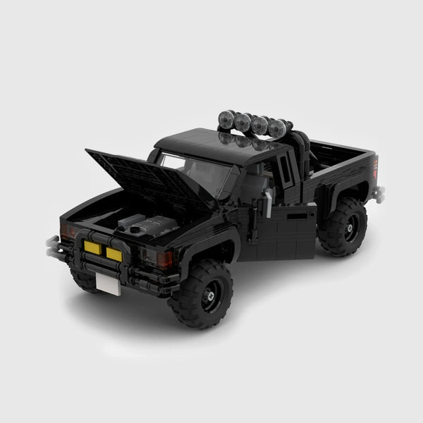 Black Toyota Hilux brick model close up detail view
