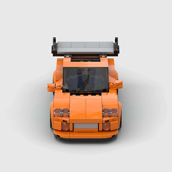 Orange with green accents Toyota Supra brick model front view