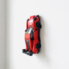 Brick car model displayed vertically on a wall with the Tourismo Brick wall mount