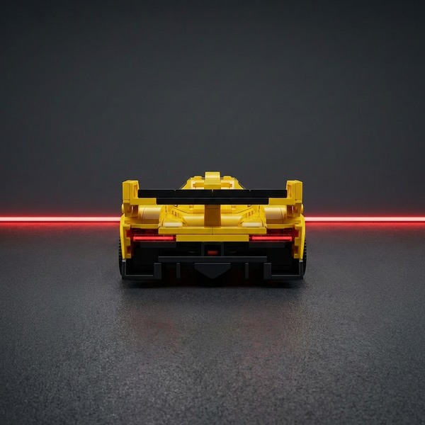 yellow racing brick car model rear view with racing wing